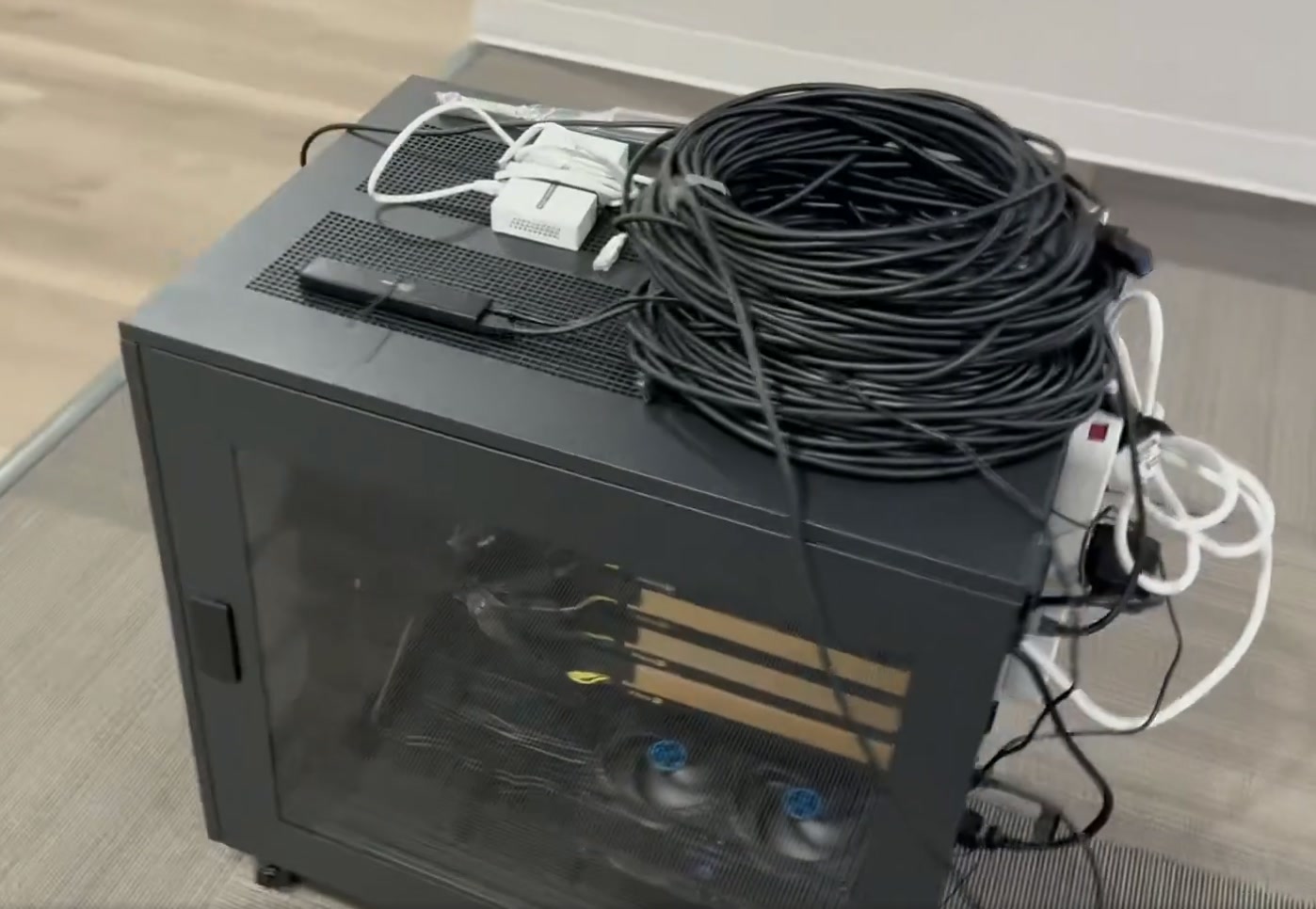 ORION, Daniel Joseph Mueller’s black personal computing tower with connected hardware